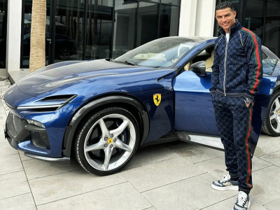 Behold Cristiano Ronaldo’s latest splurge: a magnificent $500,000 Ferrari Purosangue, the newest star in his opulent $22 million car ensemble.
