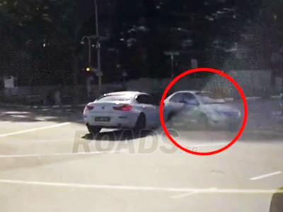 Where did THAT come from? Bizarre moment 'ghost car' appears out of nowhere to cause crash in Singapore
