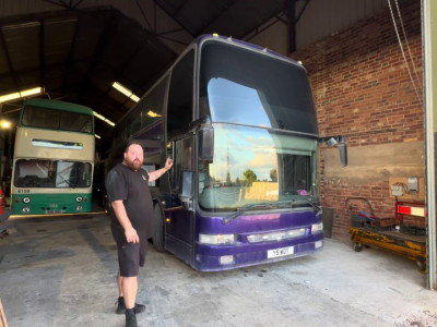 PERMISSION TO DRIVE We live in a beloved British band’s tour bus with our four kids after getting sick of paying rent on our house